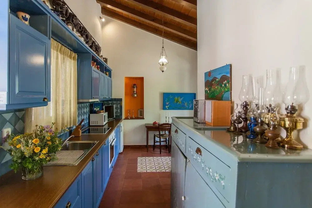 Dine on the Generous Veranda at a Rustic Stone Getaway