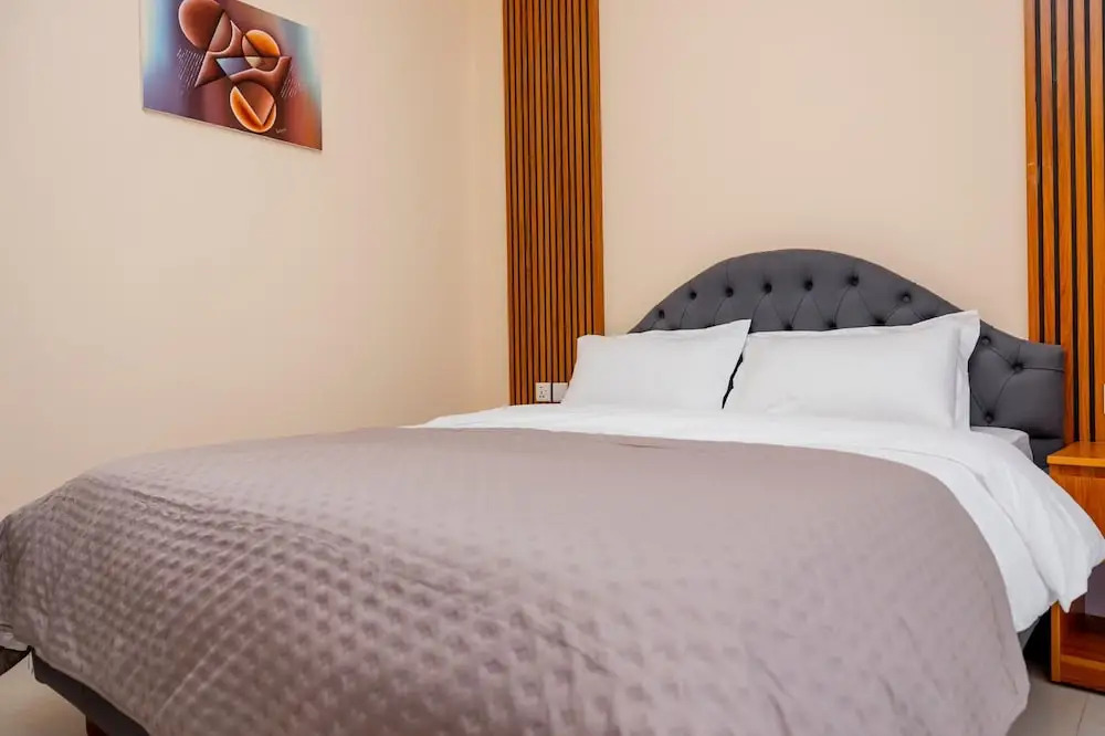 Q-Plus Apartments