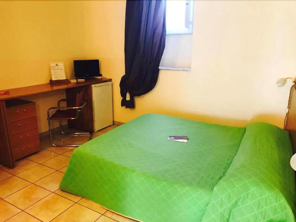 Corato room economy