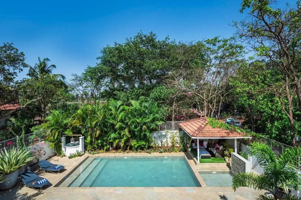 SaffronStays Sweet Mango - 4BR Goan Villa w Private Pool, Mango Garden, Bar Gazebo & Vibrant Interiors Near Beaches
