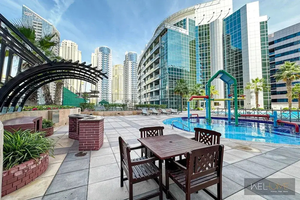 WelHome - Mesmerizing 1BR Apartment in Damac Waves A