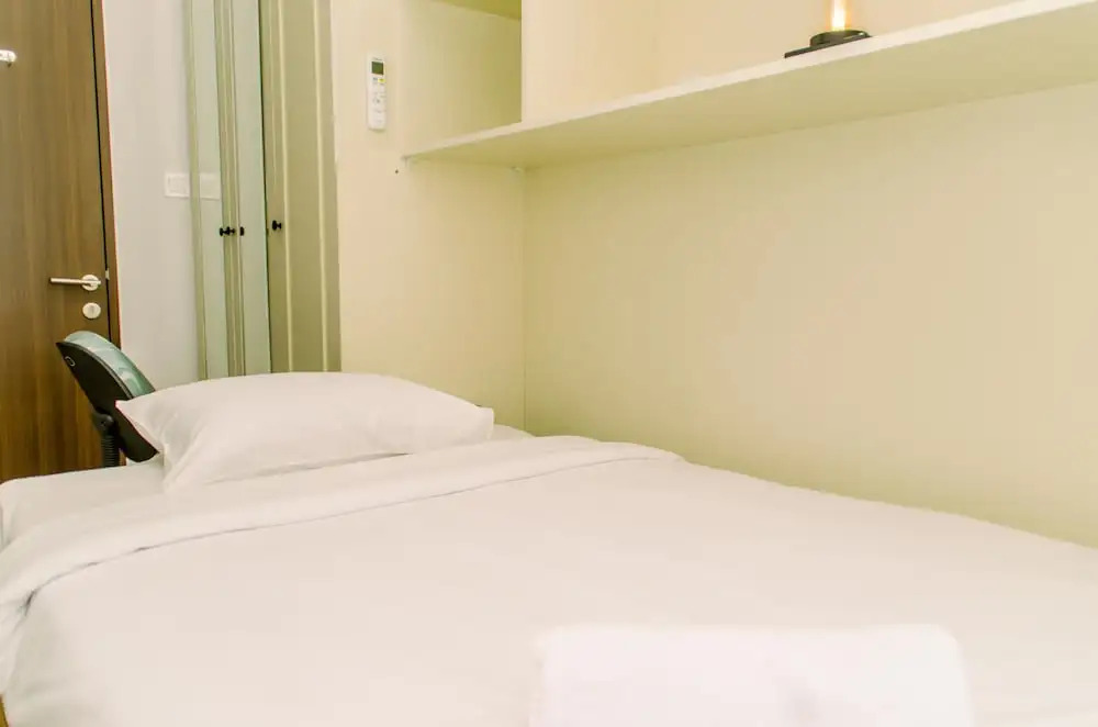 Comfort and Homey 2BR at Transpark Bintaro Apartment By Travelio