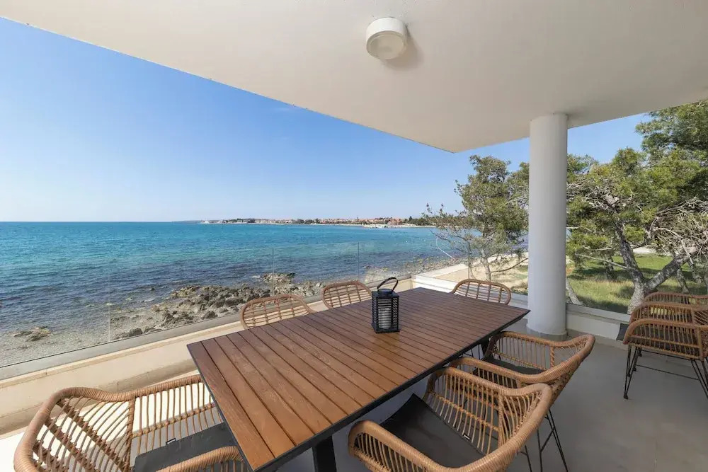 Aqua Blue by Belmont Realty