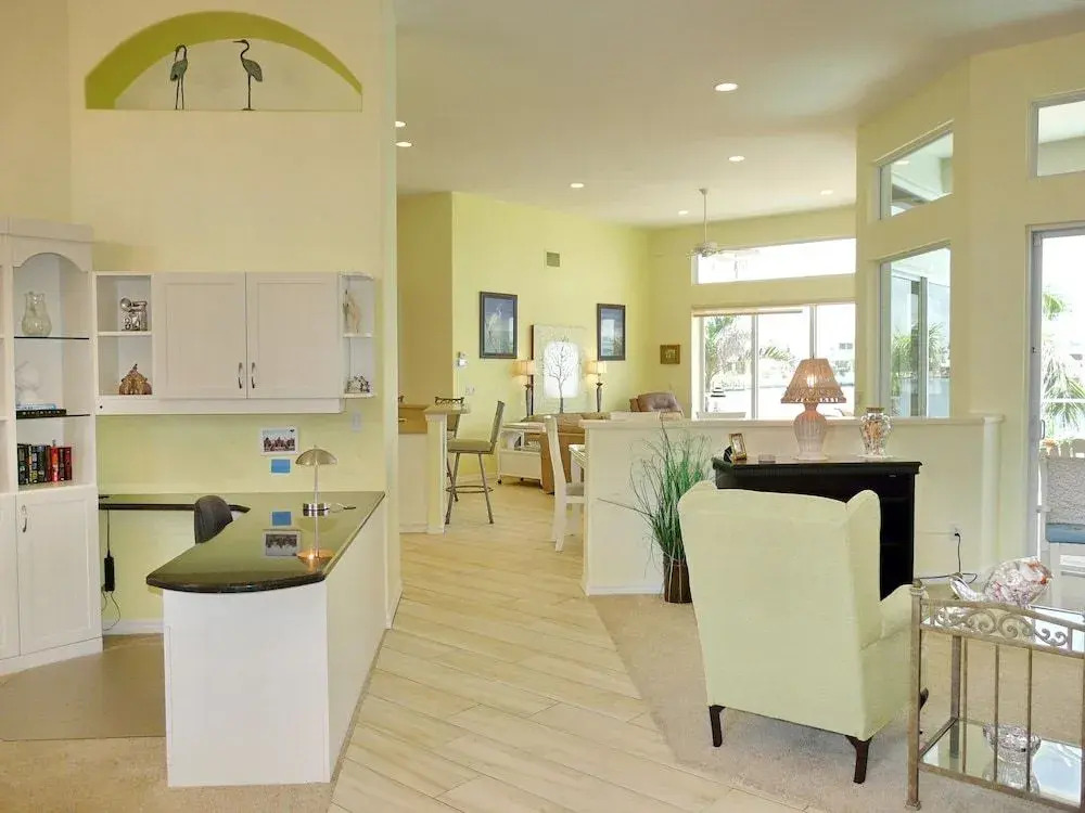 Waterfront home with views, pool and walk to beach