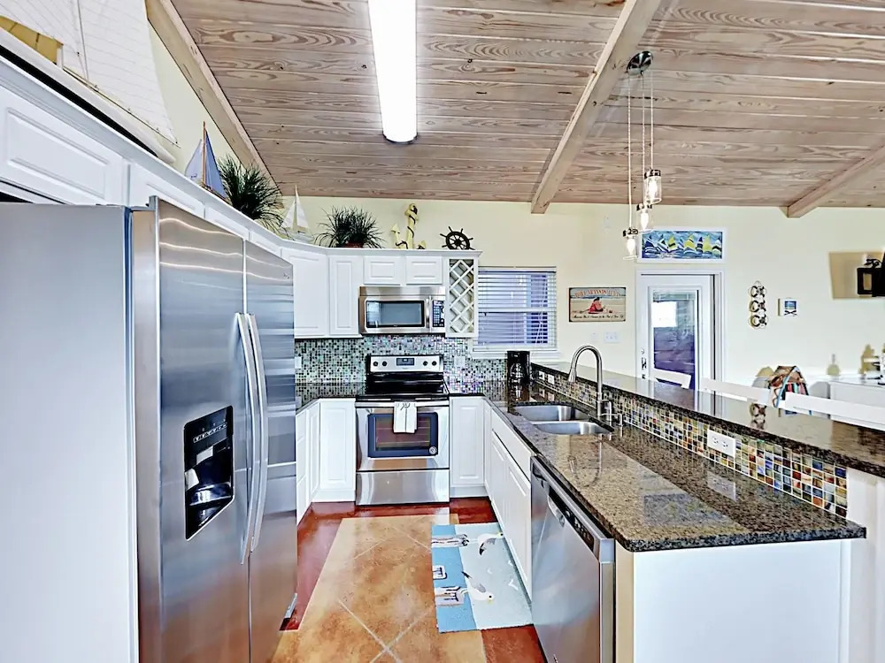 Sail Away Coastal Port Aransas Condo by RedAwning