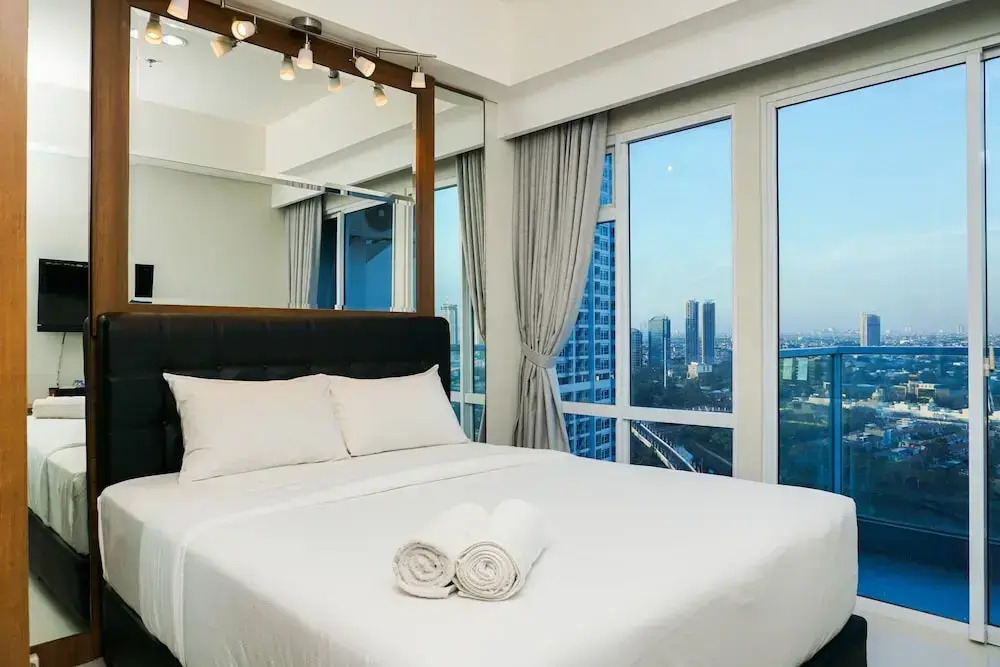 Minimalist Studio Room at Puri Mansion Apartment