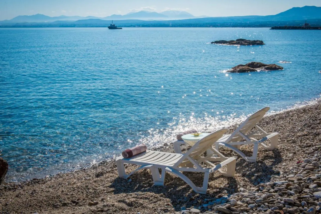 Exclusive Seaside Retreat with Shared Pool & Private Beach Access
