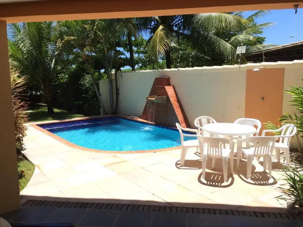 Casa frente praia na av beira mar com piscina