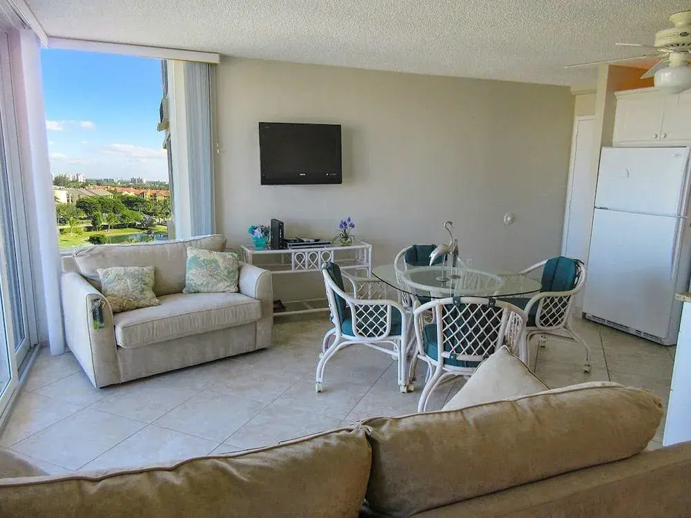 Estero Beach & Tennis #801A by RedAwning