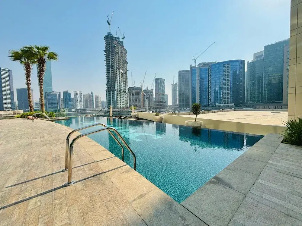 Stunning Studio Dubai with Infinity Pool and Canal View