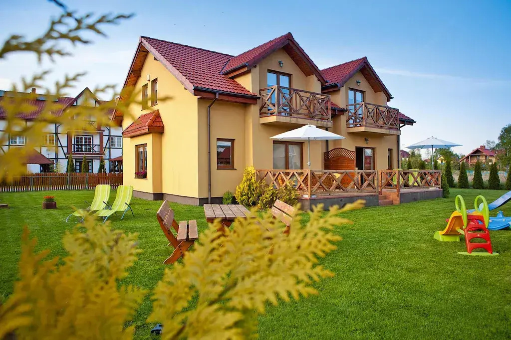 Half of holiday home, terrace, playground