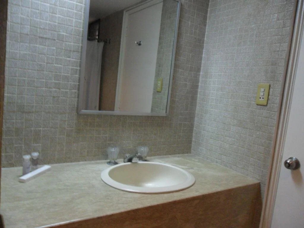Amorsolo Mansion Apartments And Suites