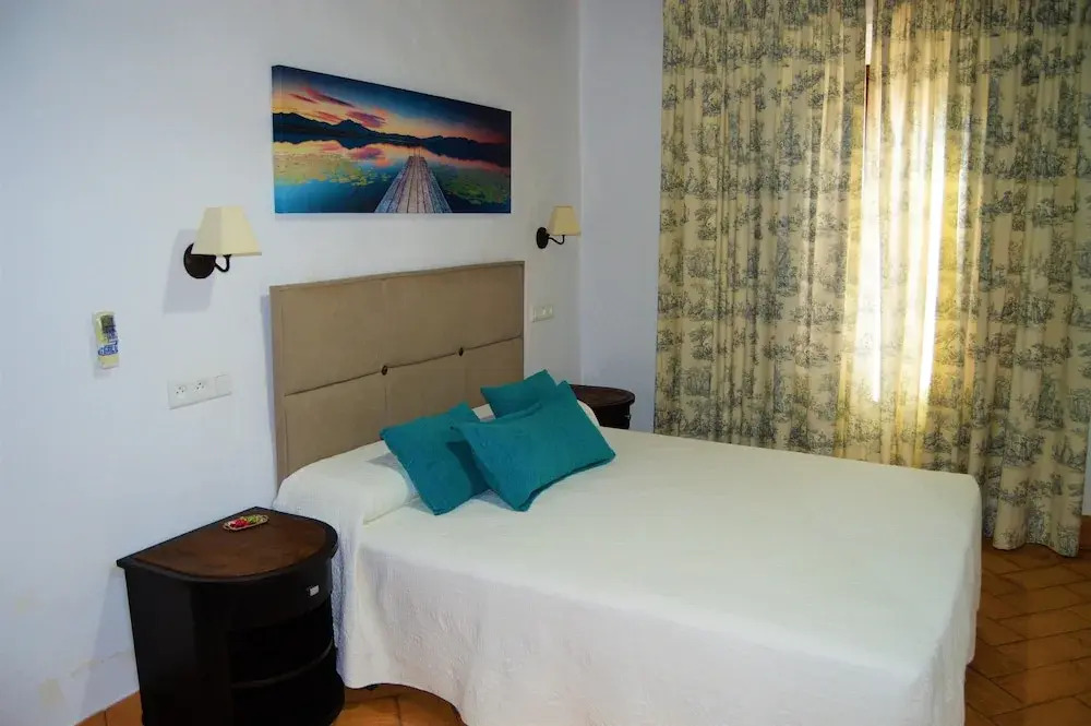 Apartamentos Turísticos - Hostal Los Alisos