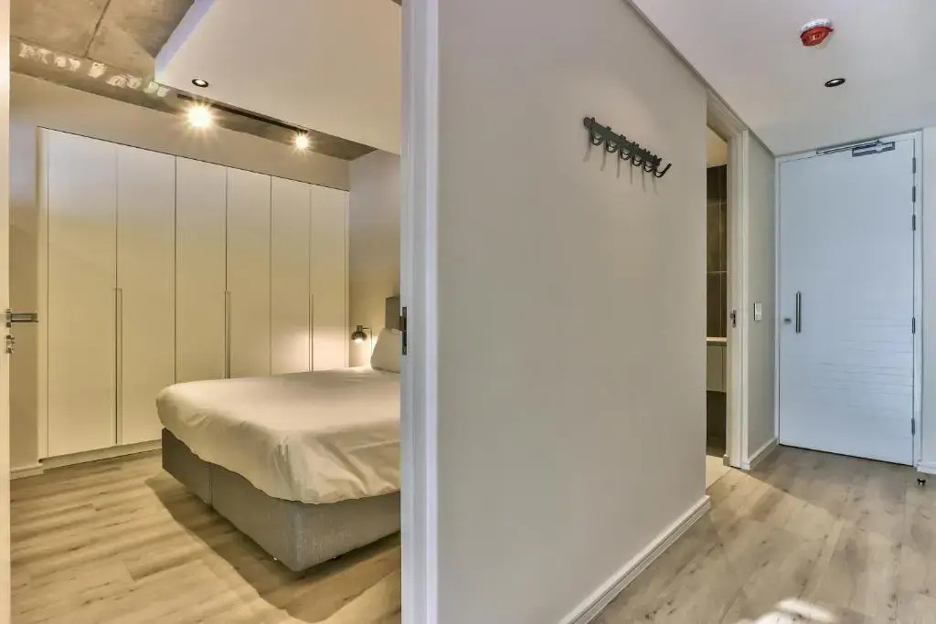 One Bedroom With Balcony and City Views