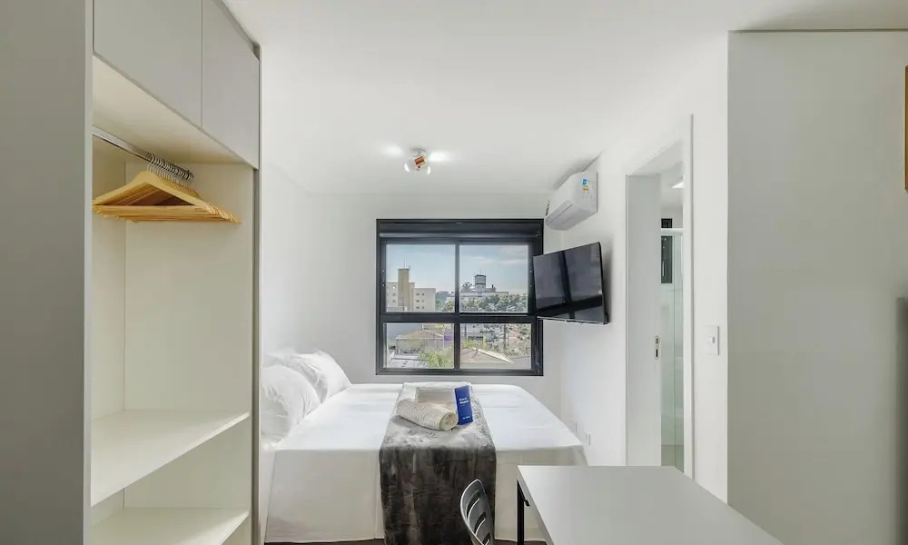 Your Complete Stay in a Building w/ a gym and Garage in Curitiba - Plags