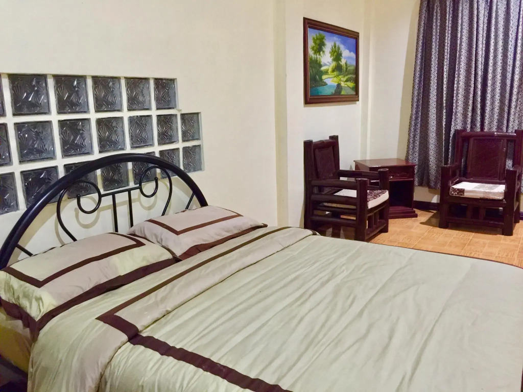 The Executive Villa Inn & Suites