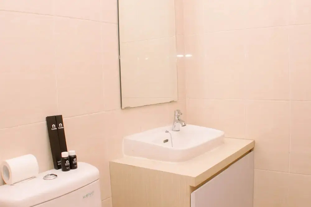 Cozy and Comfort Living 1BR at Oasis Cikarang Apartment By Travelio