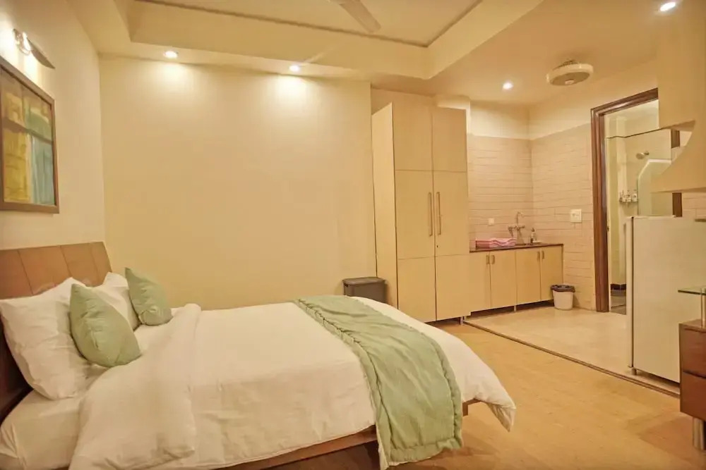 Enkay Suites - DLF CyberCity