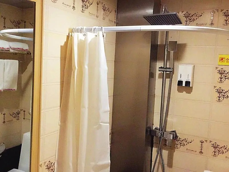 Отель GreenTree Inn Rizhao Donggang Area Haina Shopping Mall Shell Hotel