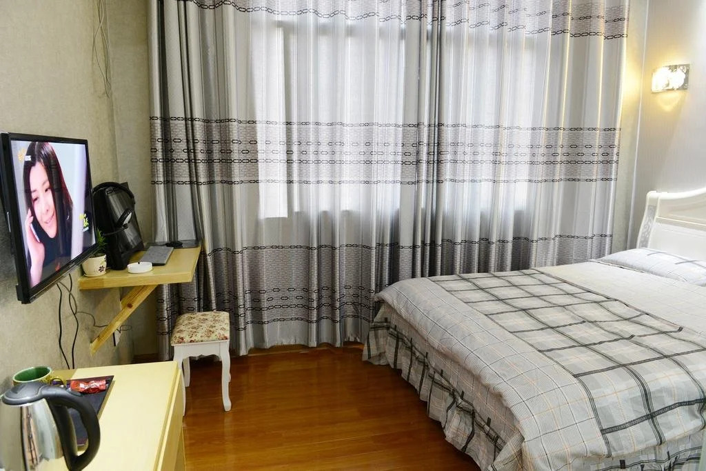 Aiqinhai Fashion Hotel