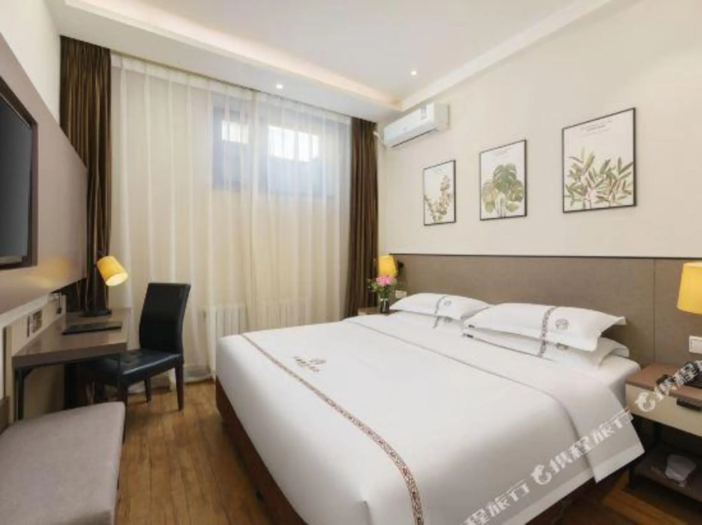 Tianxi Collection Hotel (Dalian Railway Station Youhao Square)