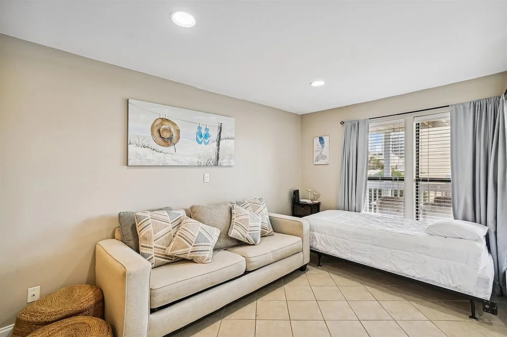 Studio With A Queen Size Bed, Twin Bed And Sofa Sleeper - Sleeps 5 0 Bedroom Condo by RedAwning