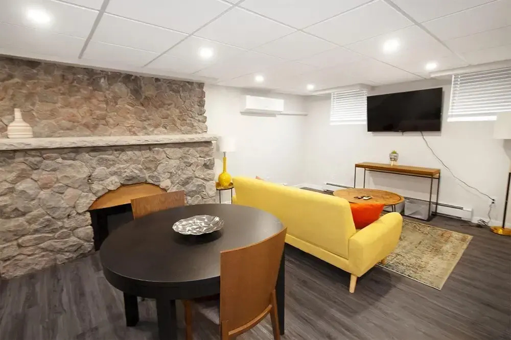 Cozy One Bedroom in a Historic Home on the Assiniboine River Lower Level Unit With Den in Wolseley Parking Included