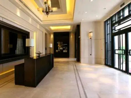 City Xinjia Apartment Hotel