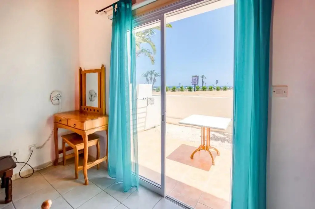 Kate's Latchi Beachfront Studio Apartment 1 by Ezoria