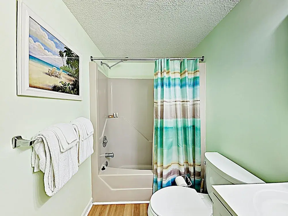 Oceanside Gem W/ Private Deck, Canal Views & Pools 2 Bedroom Condo