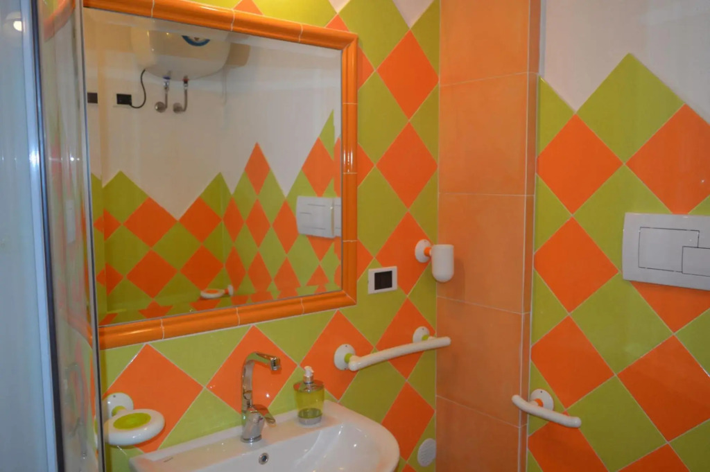 Apartment surrounded by greenery 5 minutes on foot from the beaches of Baia Caddinas and the large s-S'Abba e sa Pedra