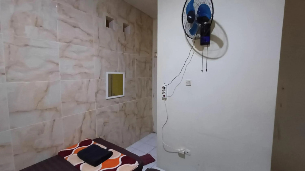 Spot On 3988 Kost Carmelia Baranangsiang Syariah