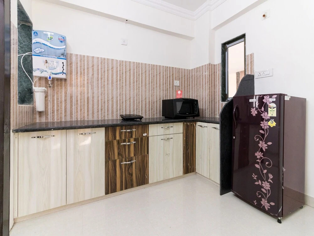 OYO Home 11410 Modern 3BHK Goverdhan Villas