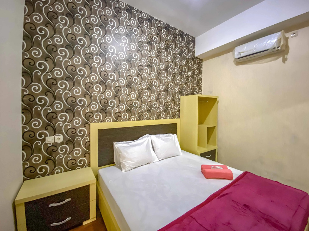 Tinis Guest House Malang Mitra RedDoorz