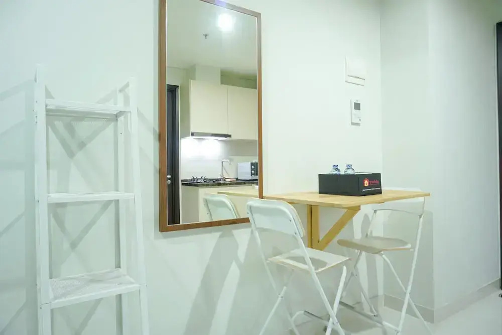 Strategic Location 1BR Apartment @ Puri Mansion near Puri By Travelio