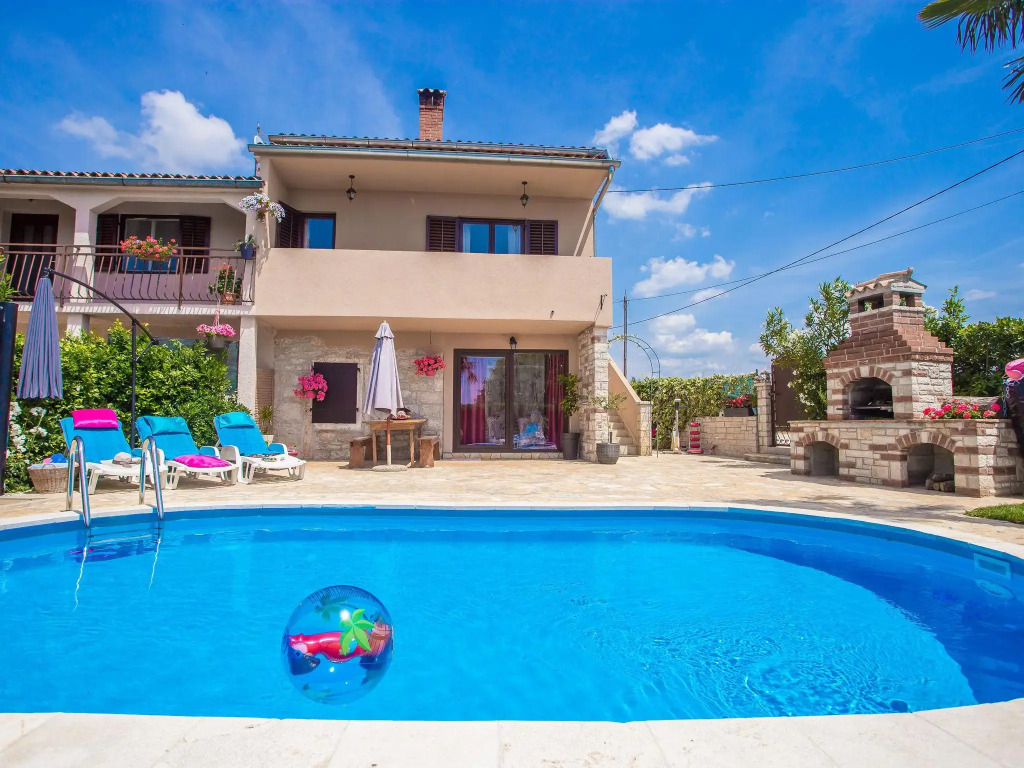 Nicely decorated semi-detached house with pool and  fenced yard