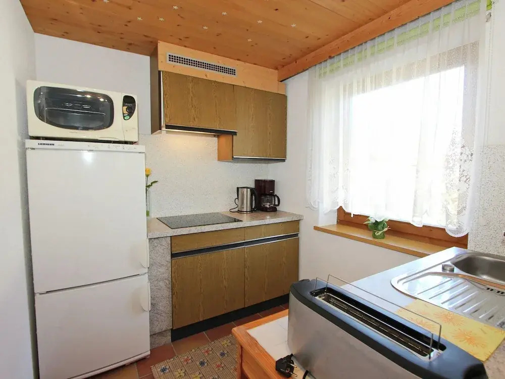 Apartment In Uderns With Balcony Cot Heating Parking