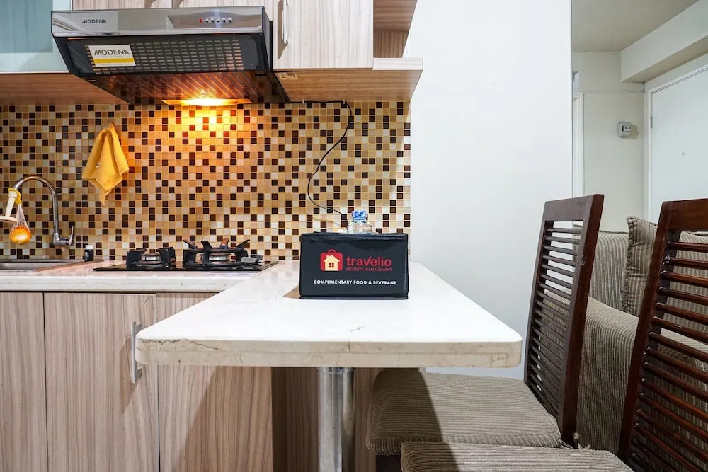 Cozy and Homey 2BR at Kalibata City Apartment