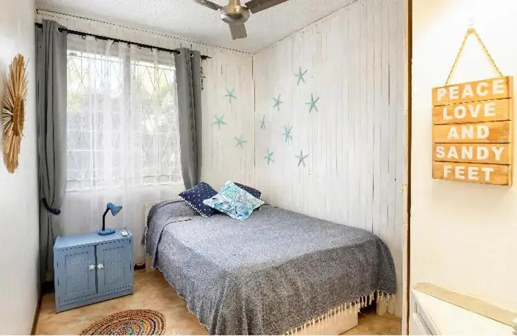 Lovely 3 bedroom beach house on a sandy beach
