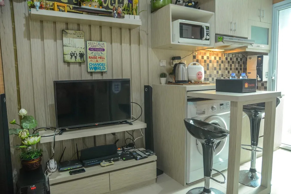 1 Bedroom at Green Pramuka Apartment by Travelio