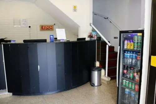 OYO 105 Guaru Plaza Hotel