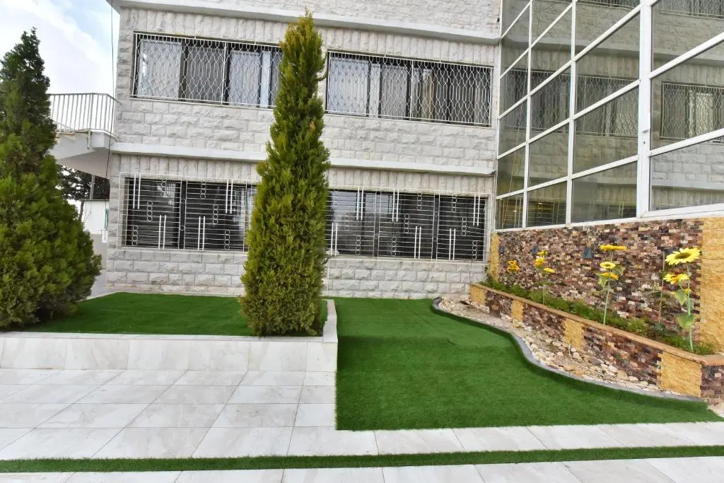 Al-Farouq Suites