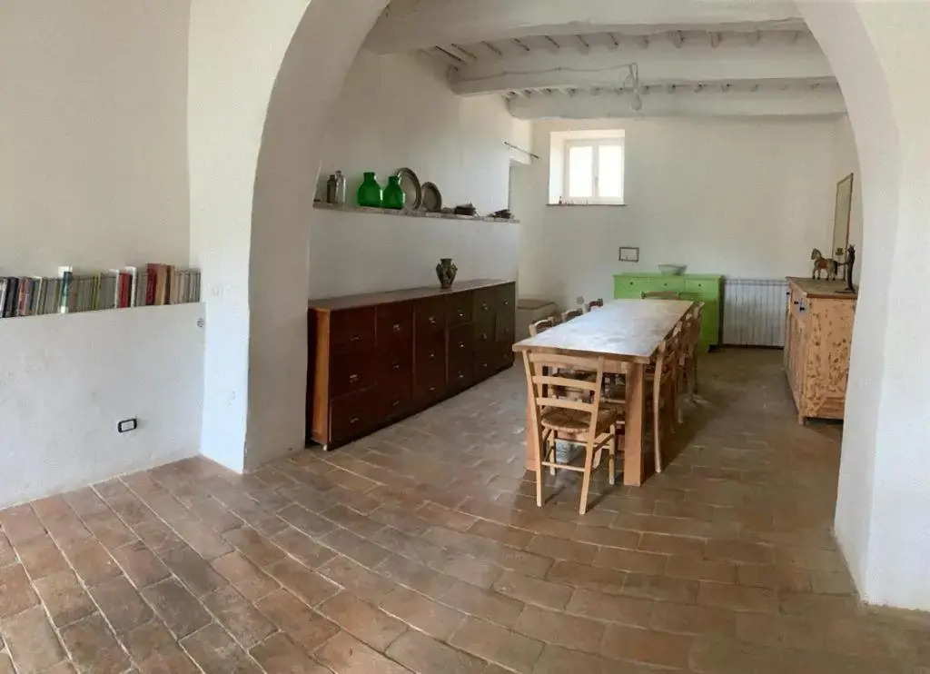 Casa del Piano Valle dei Calanchi in front of Civita Di Bagnoregio