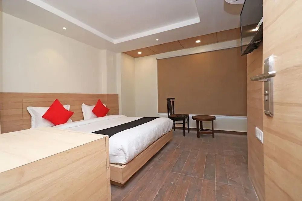 Capital O 30624 Hotel Triton
