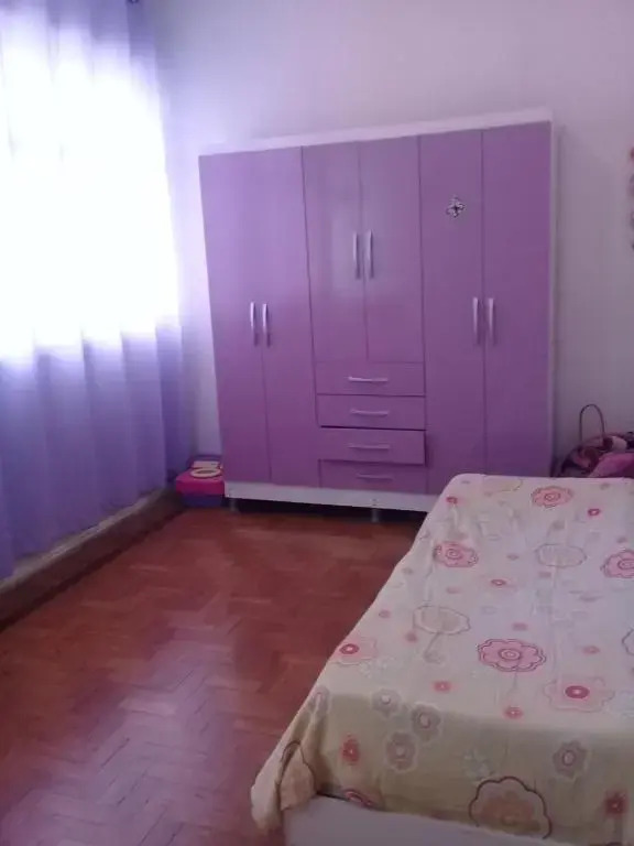 Casarão com piscina e churrasqueira
