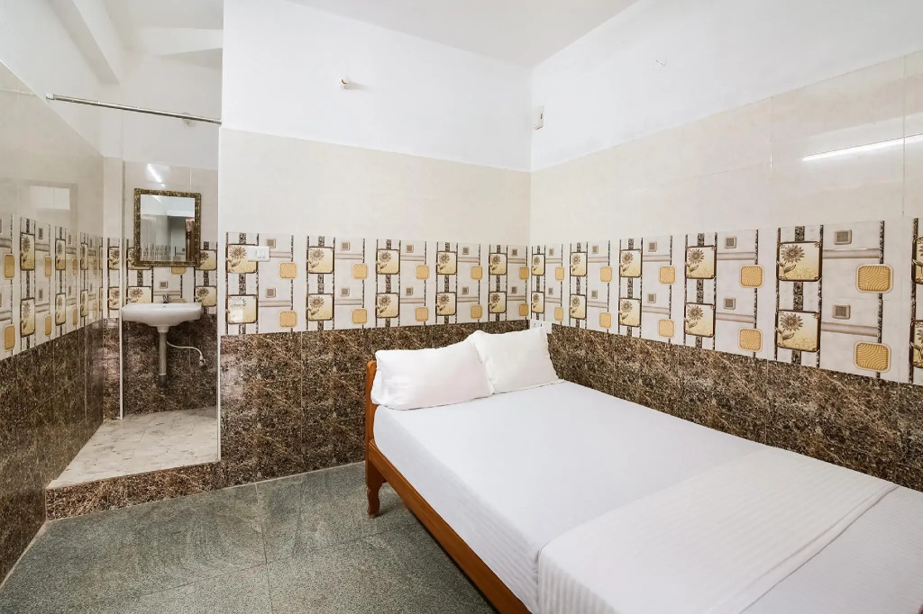 SPOT ON 47779 Thirugnanasamandham Rooms