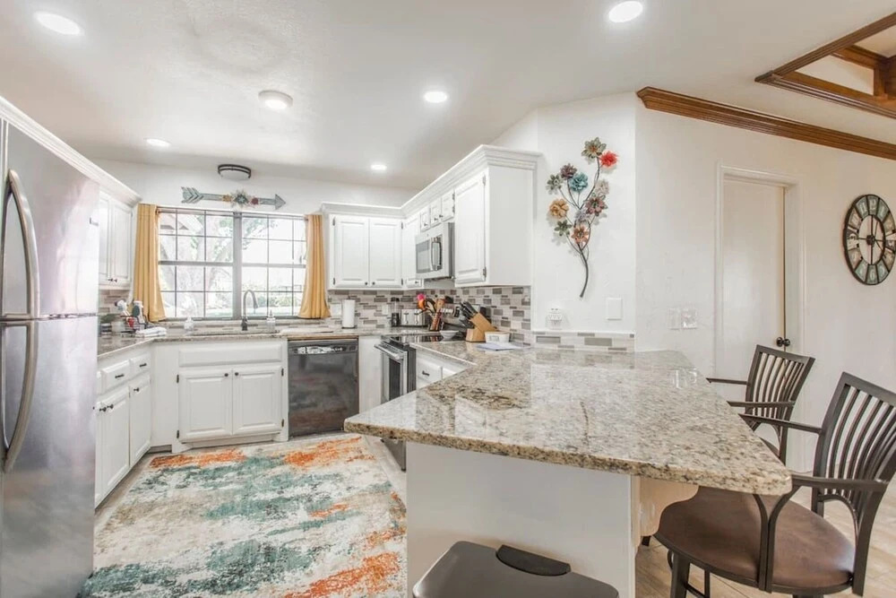 Spacious Retreat With Shaded Yard & Games 4 Bedroom Home by RedAwning