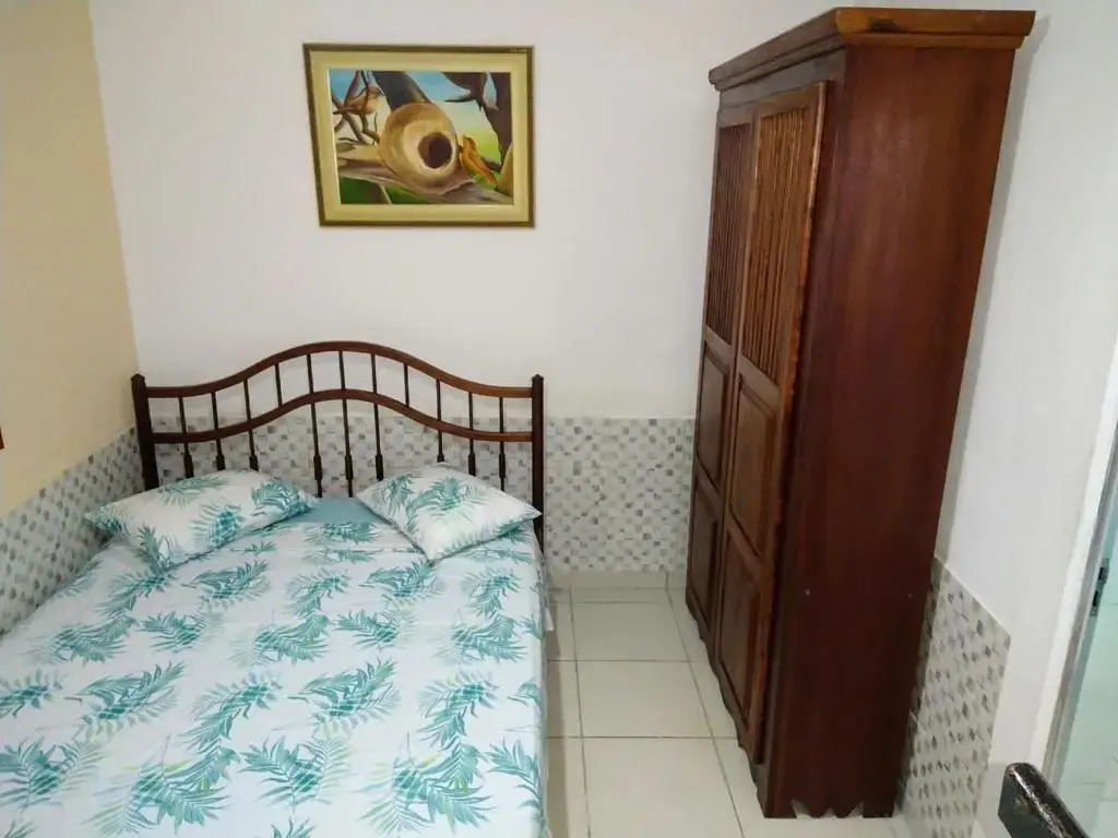 Suíte 10 com wifi a 4 min da praia em Caraguatatuba
