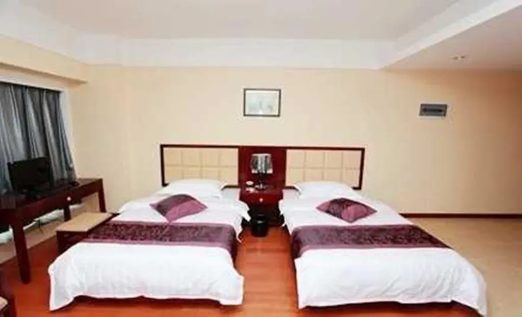 Manhattan Business Hotel Zhengzhou Shenglong Building Branch