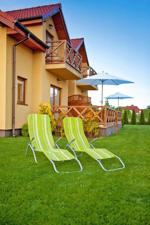 Half of holiday home, terrace, playground